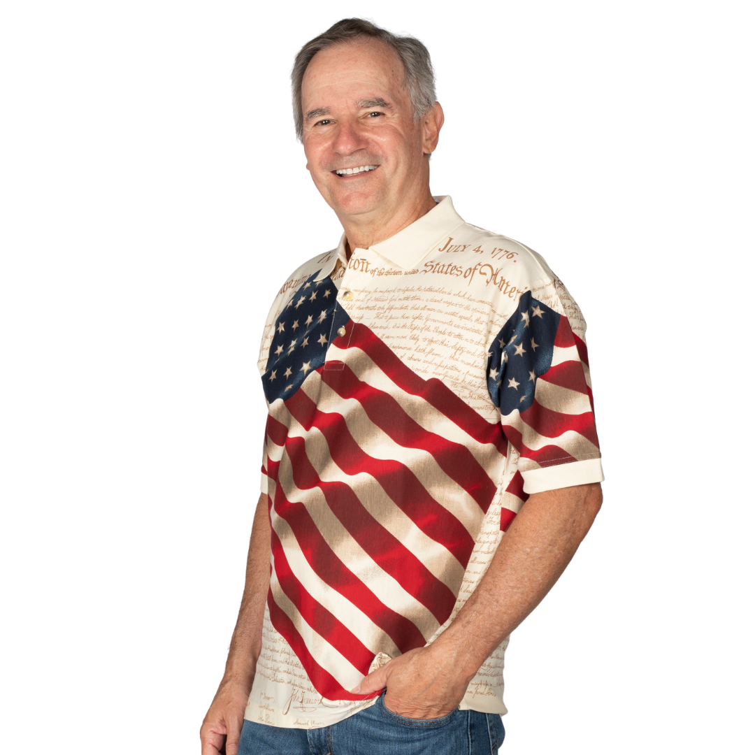 Emblazoned with the iconic text of the Declaration of Independence and a resolute waving flag  on front and back of Natural color shirt 100% Cotton